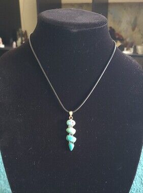 Turquoise Stone Pendant Necklace On Black Cord